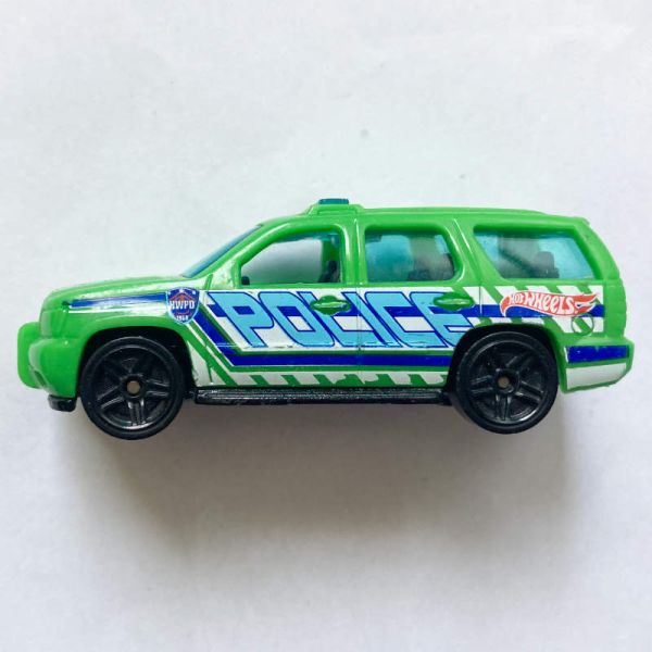 Hot Wheels | '07 Chevy Tahoe POLICE light green 2015 without packaging